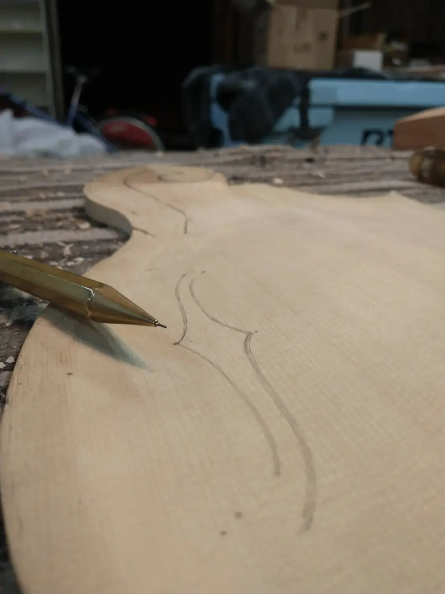 F-hole layout and cut