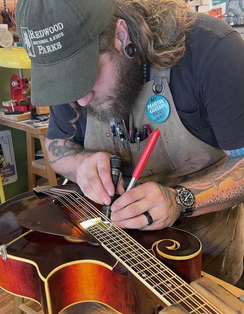 Jake inspecting an instrument