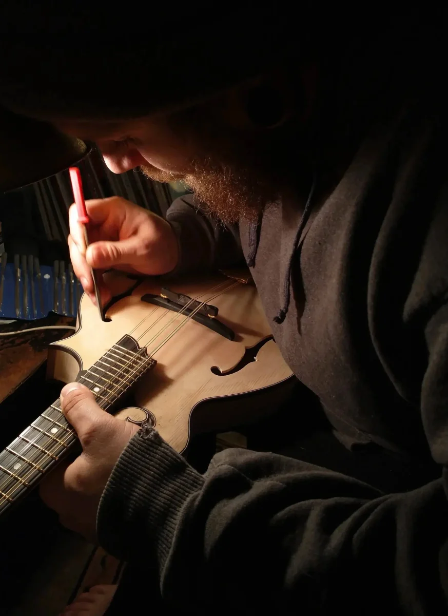 Working with precision tools on mandolin construction