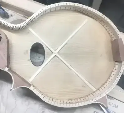 X-brace pattern inside mandolin top