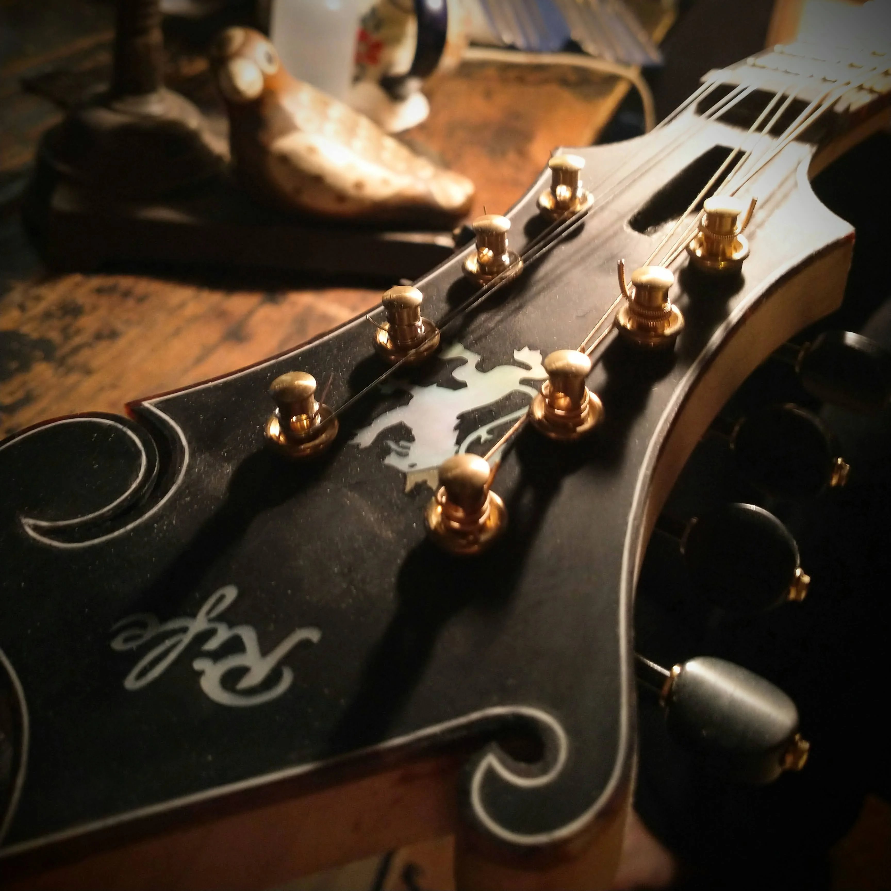 Finished headstock with tuners and logo