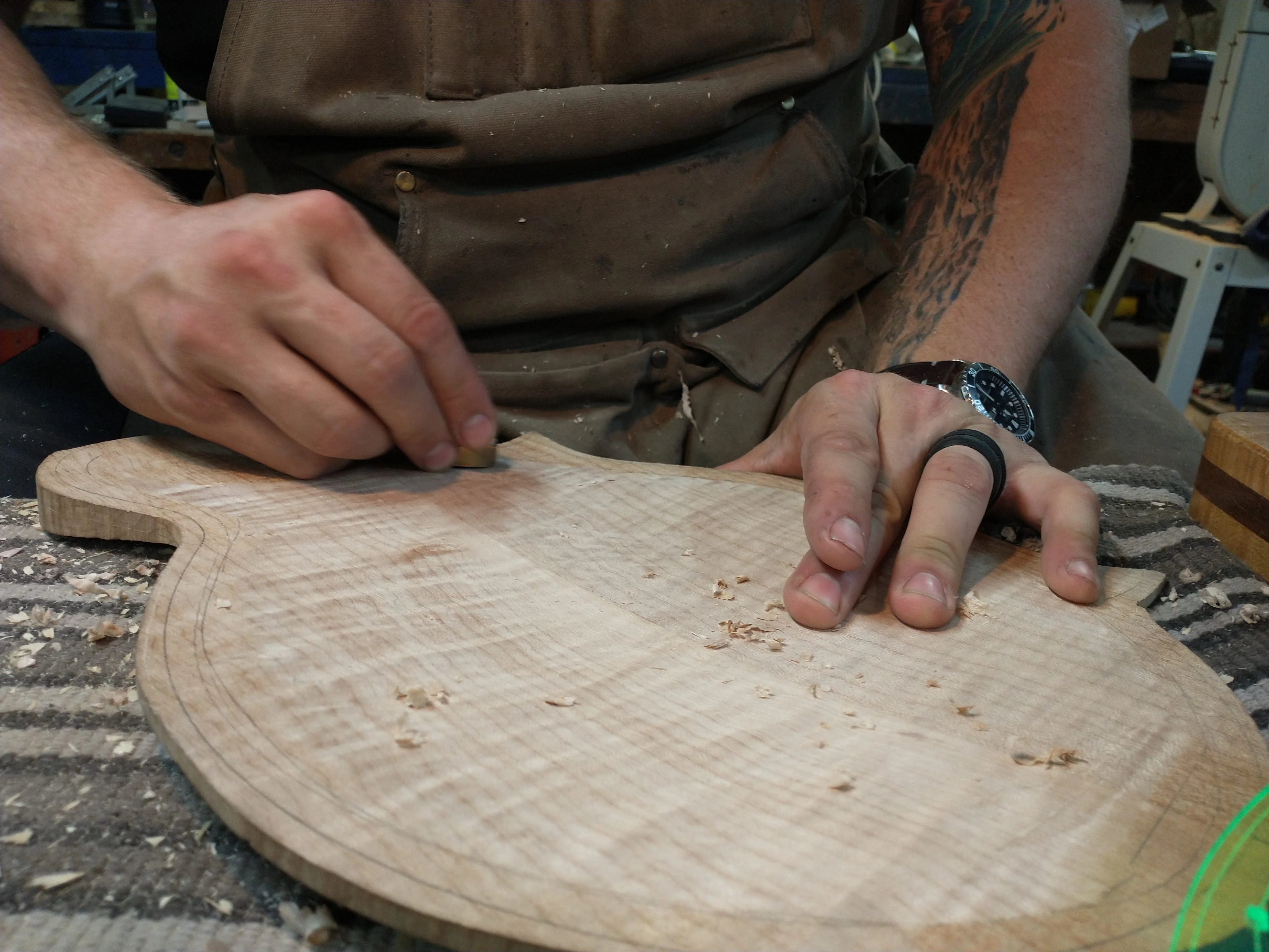 Hand sanding the mandolin top before finish