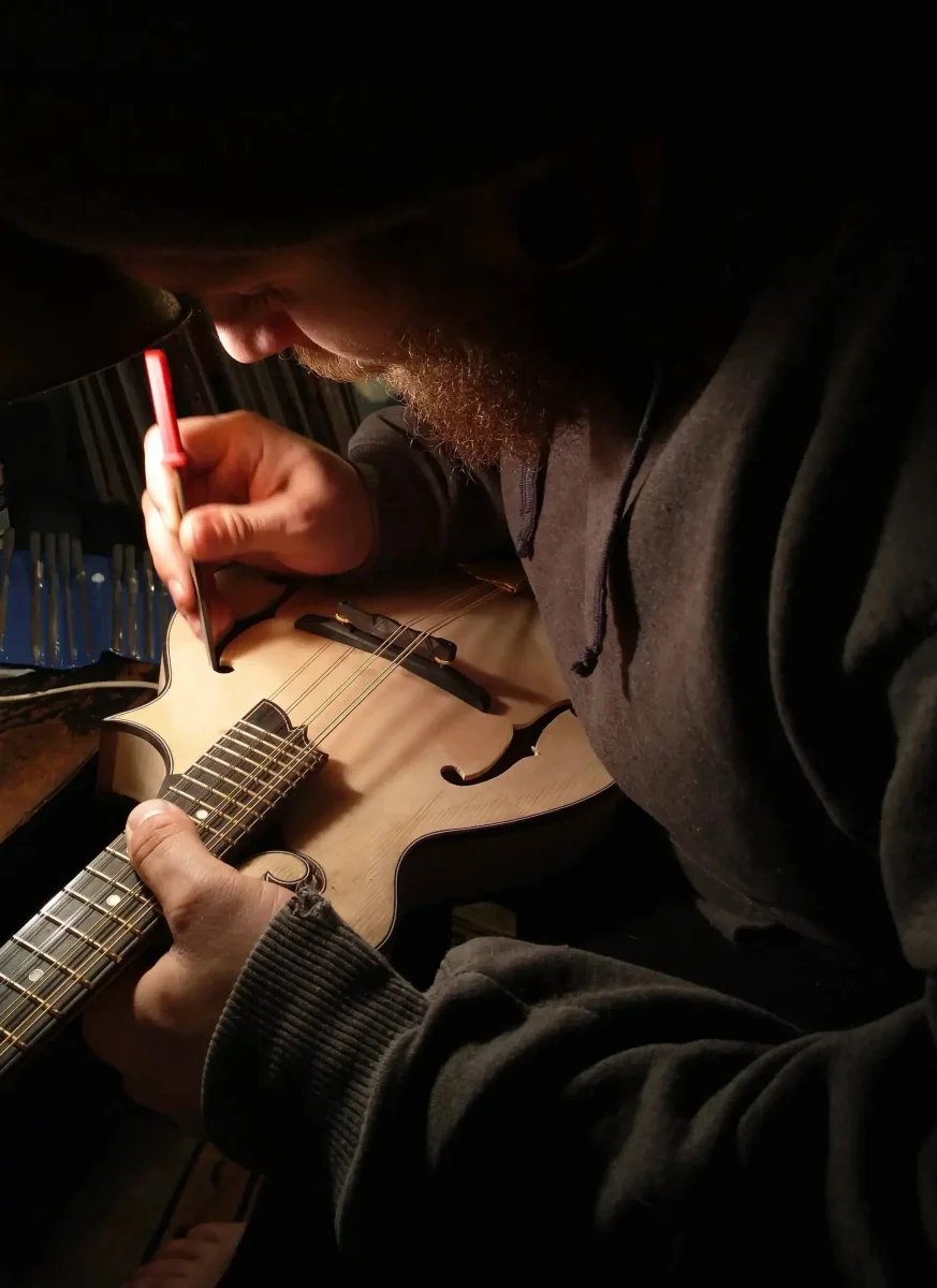 Working with precision tools on mandolin construction